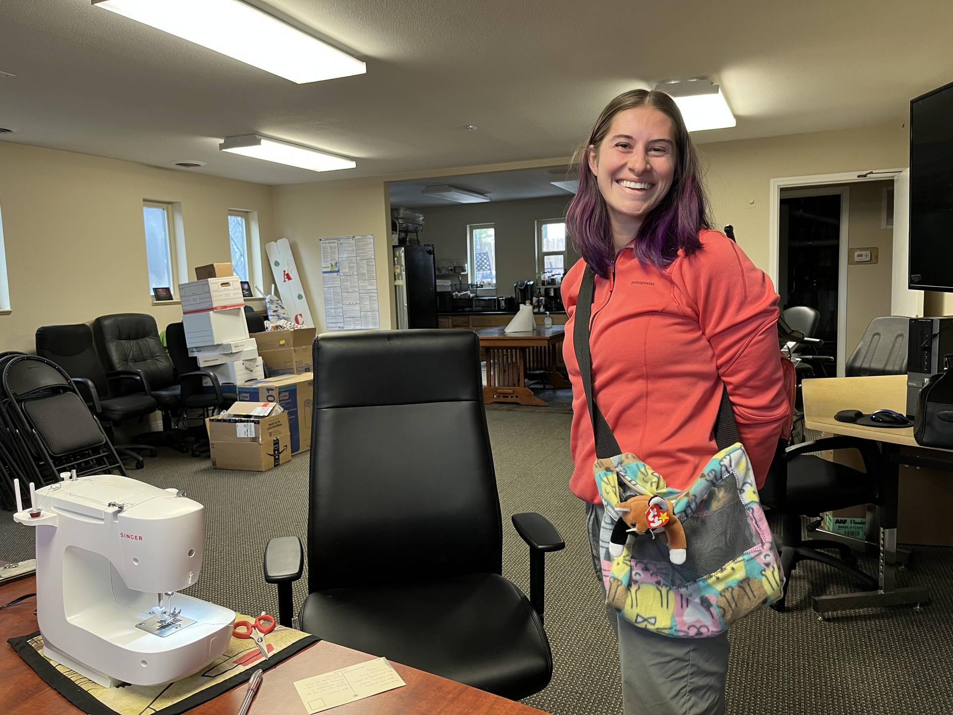 sewing student with kitty bag