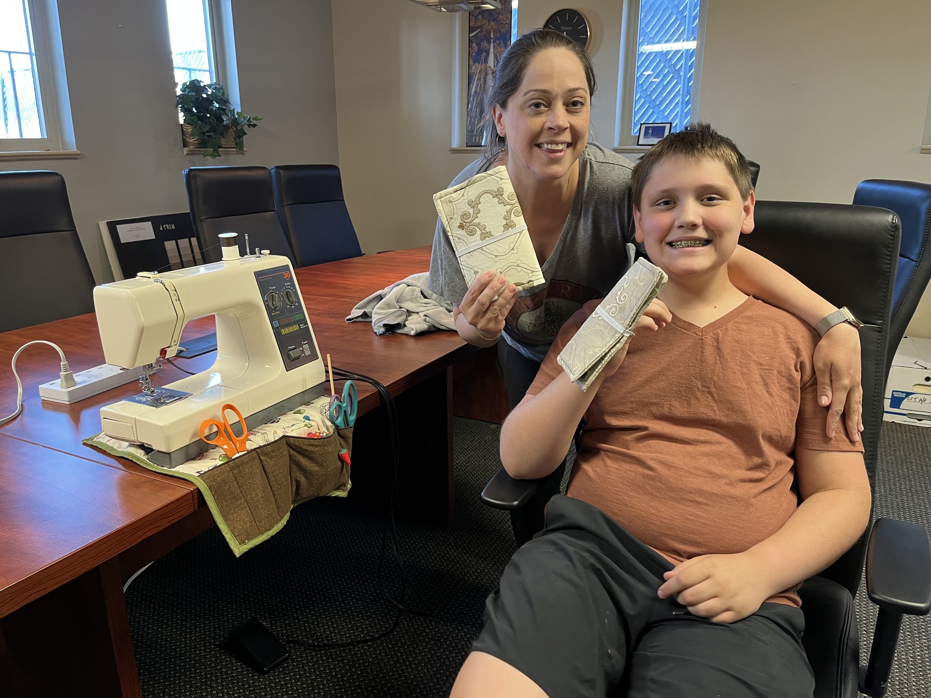 mom and son sewing students