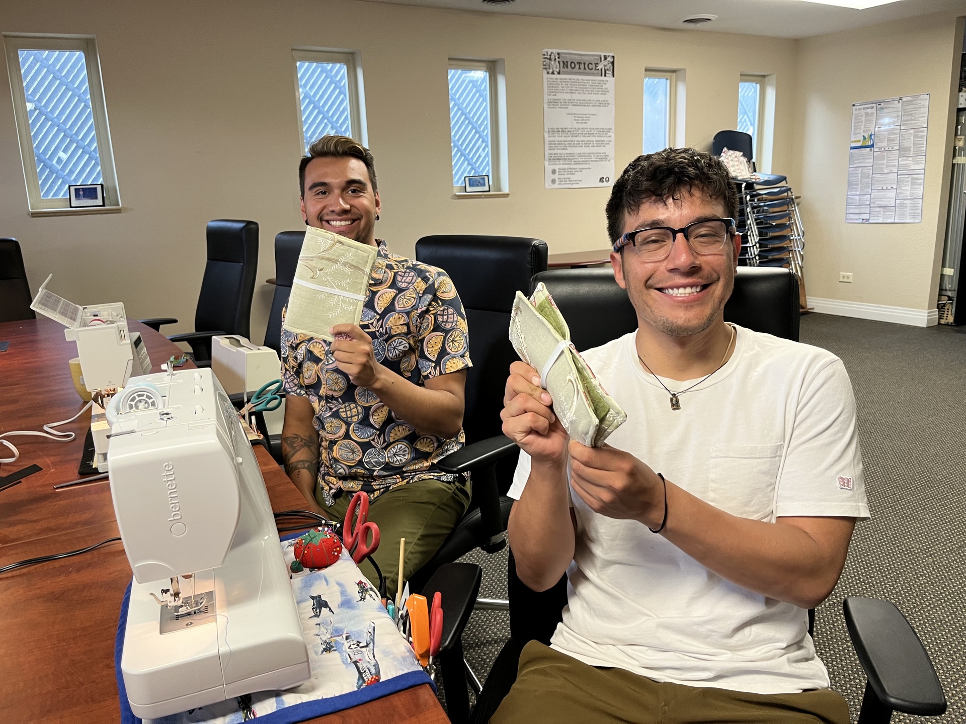 male students sewing